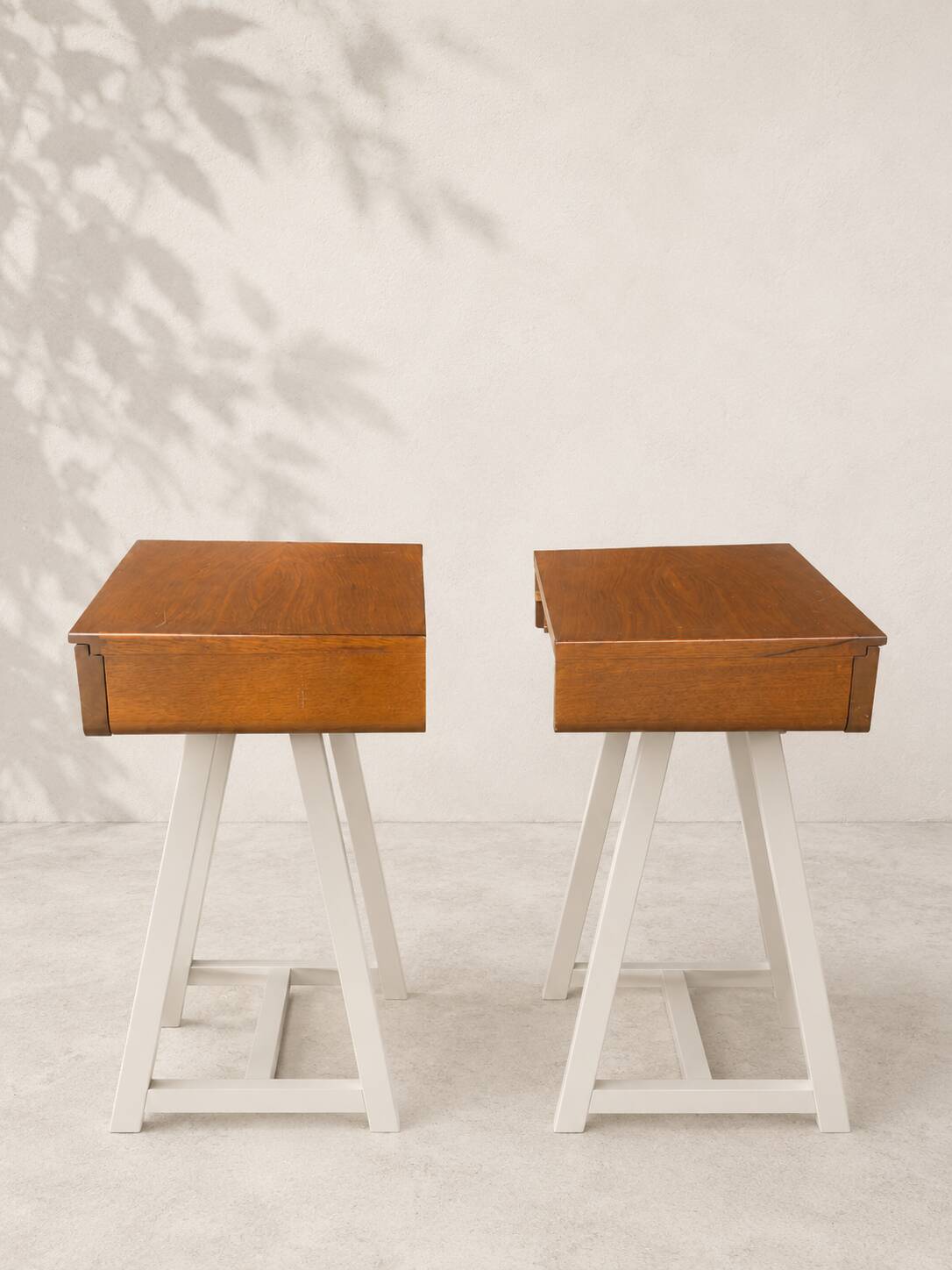 Pair of modernist wooden wall-mounted bedside tables – 1960s