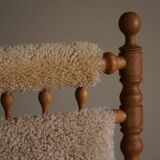 Pair of sculptural Danish modern rocking chairs in lambswool and oak, brutalist, 1950.
