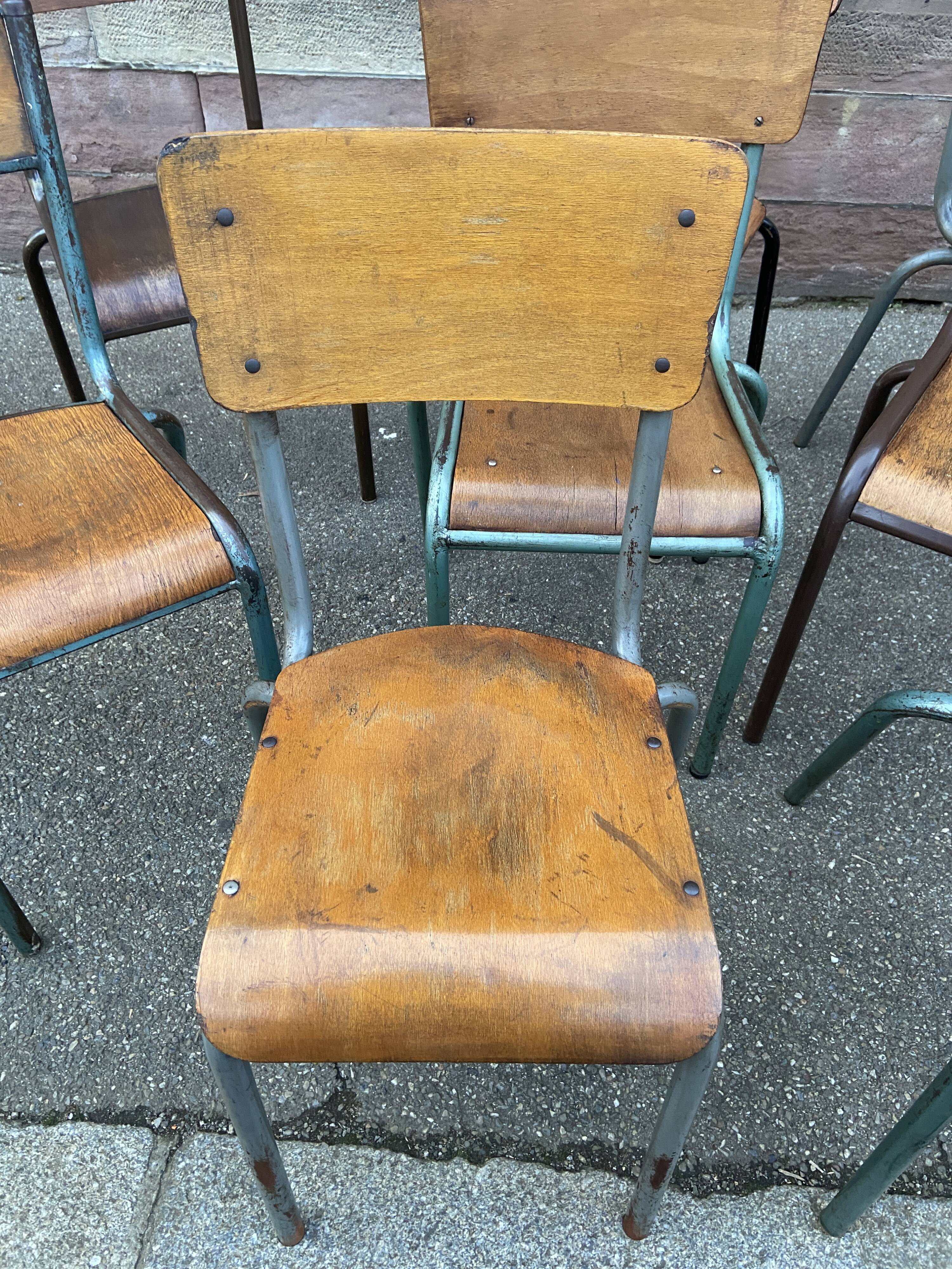 Set of 10 vintage mismatched industrial chairs mullca