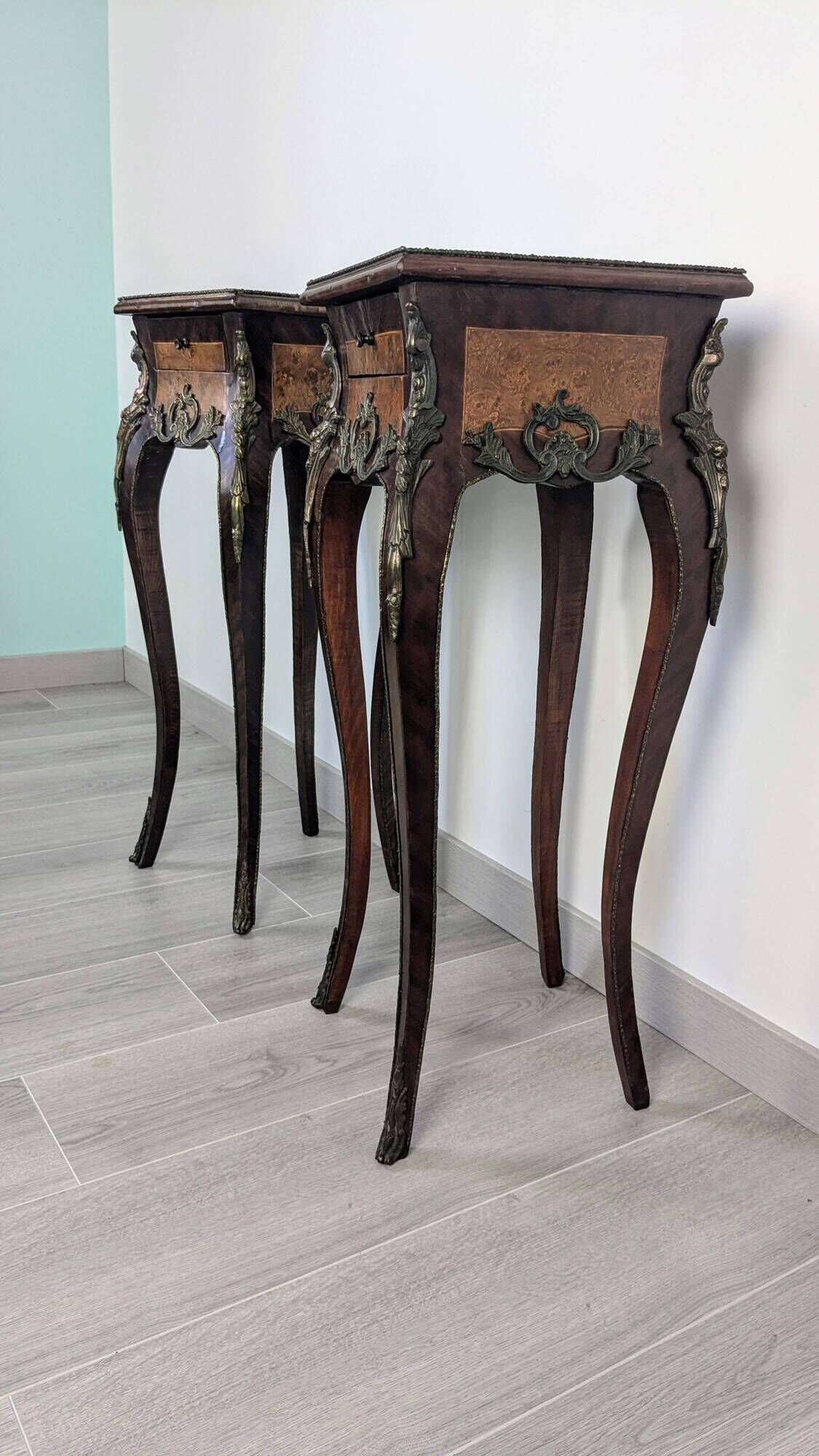Pair of Louis XV bedside tables with marquetry and gilded bronzes