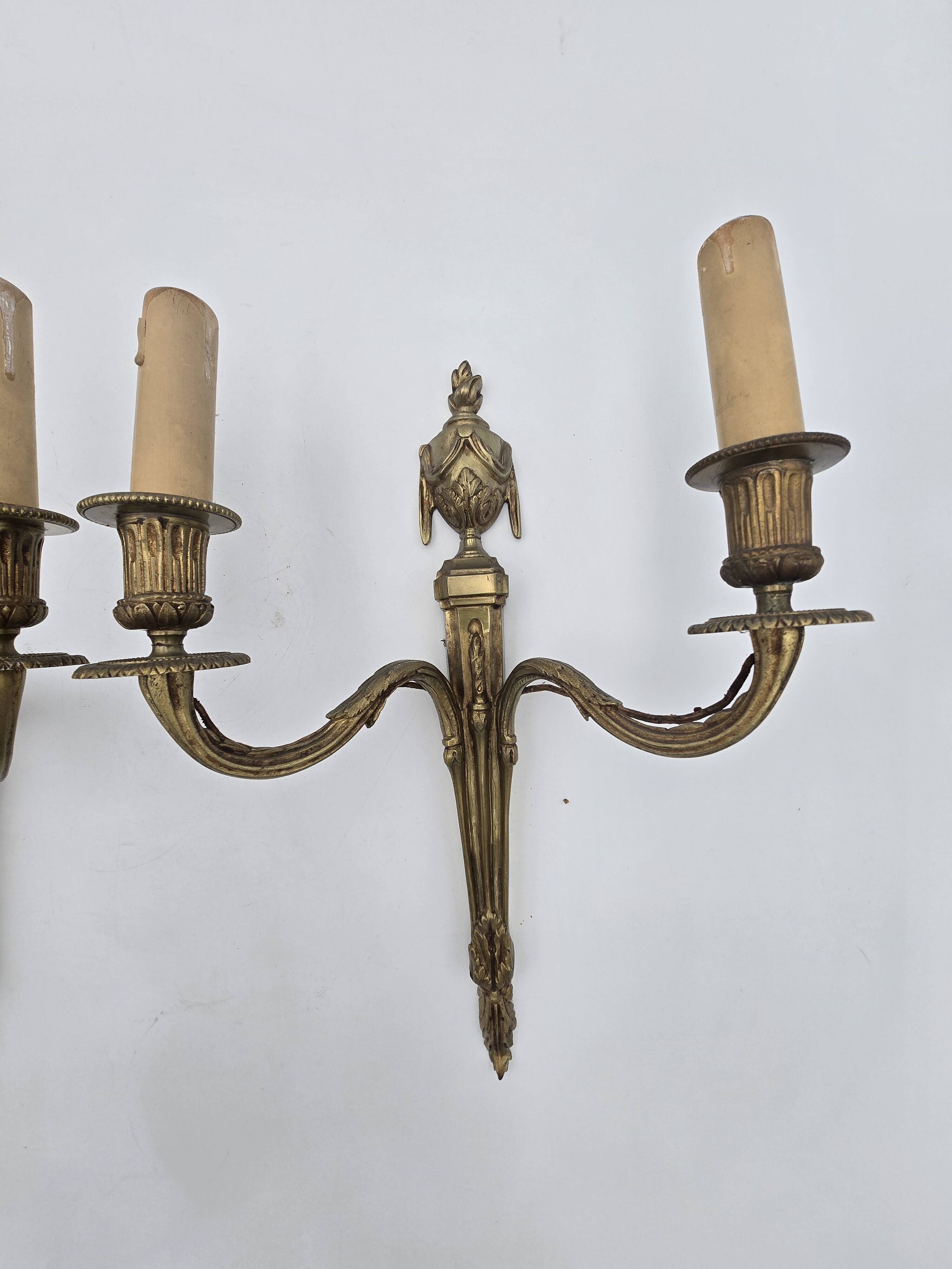 Pair of antique Louis XVI style bronze wall lights