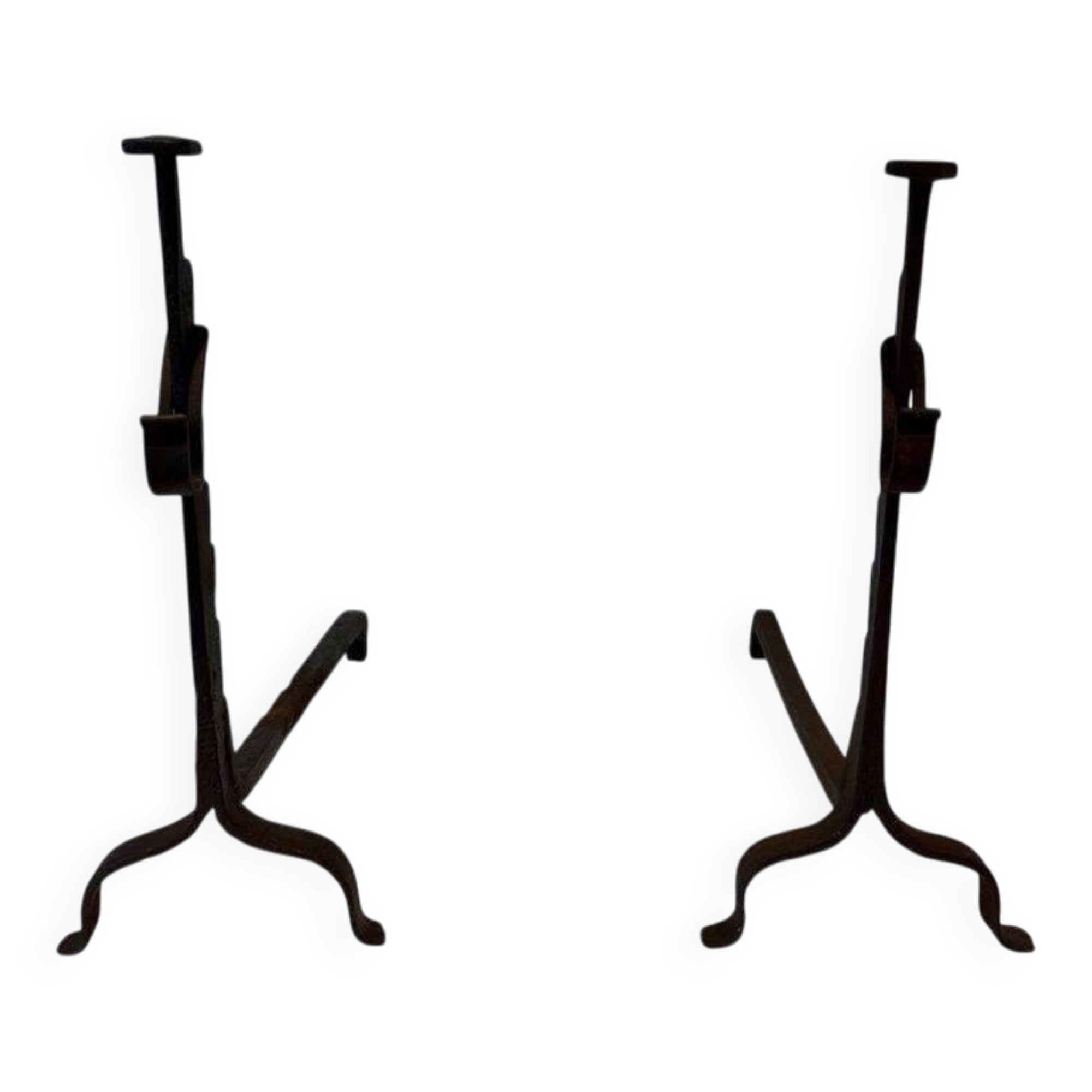 Pair of wrought iron andirons with adjustable supports and tripod feet.