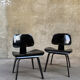 Pair of DCW chairs by Charles & Ray Eames in Black for Herman Miller 1950