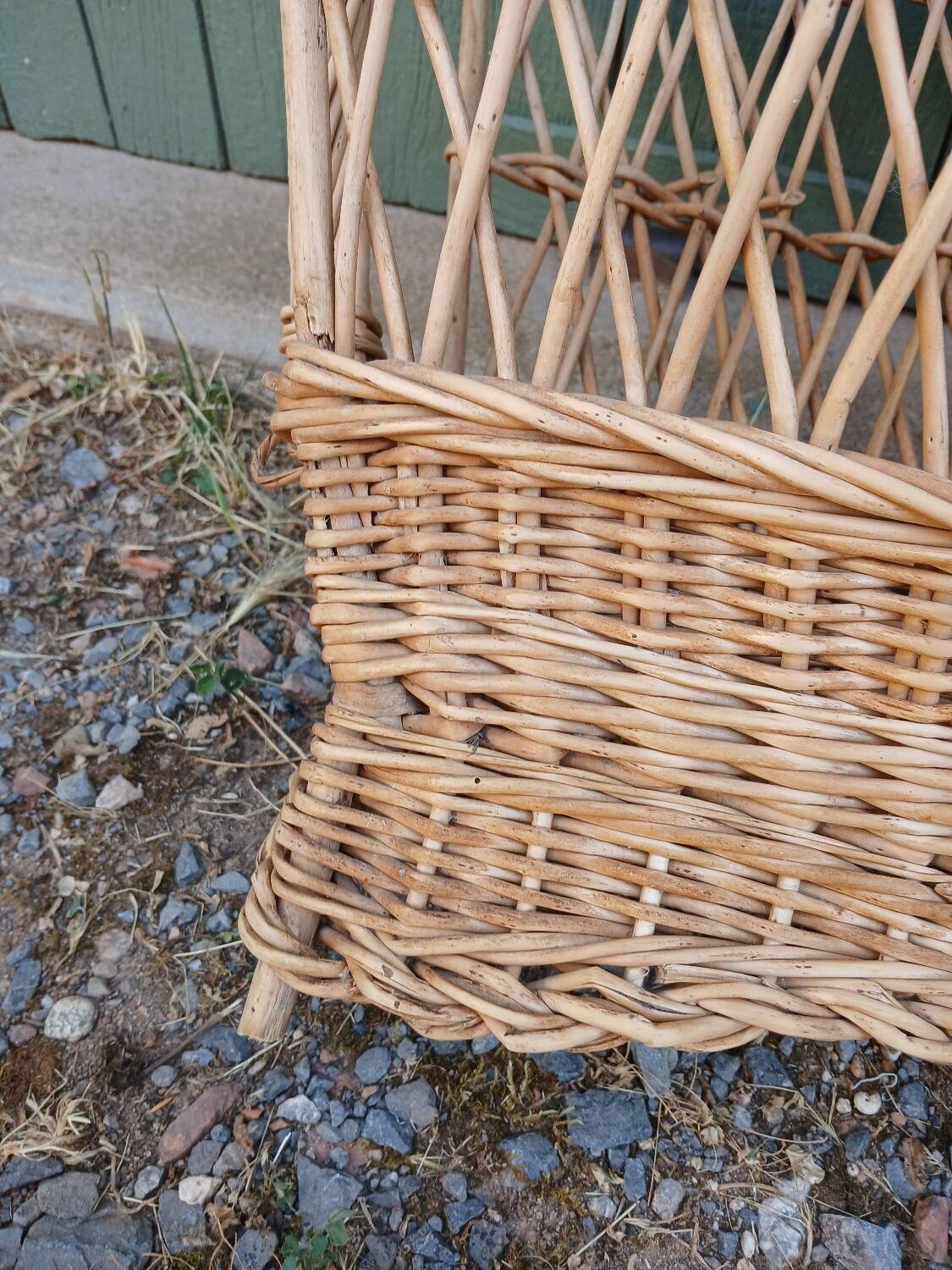 Antique wicker magazine rack