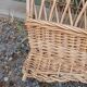Antique wicker magazine rack