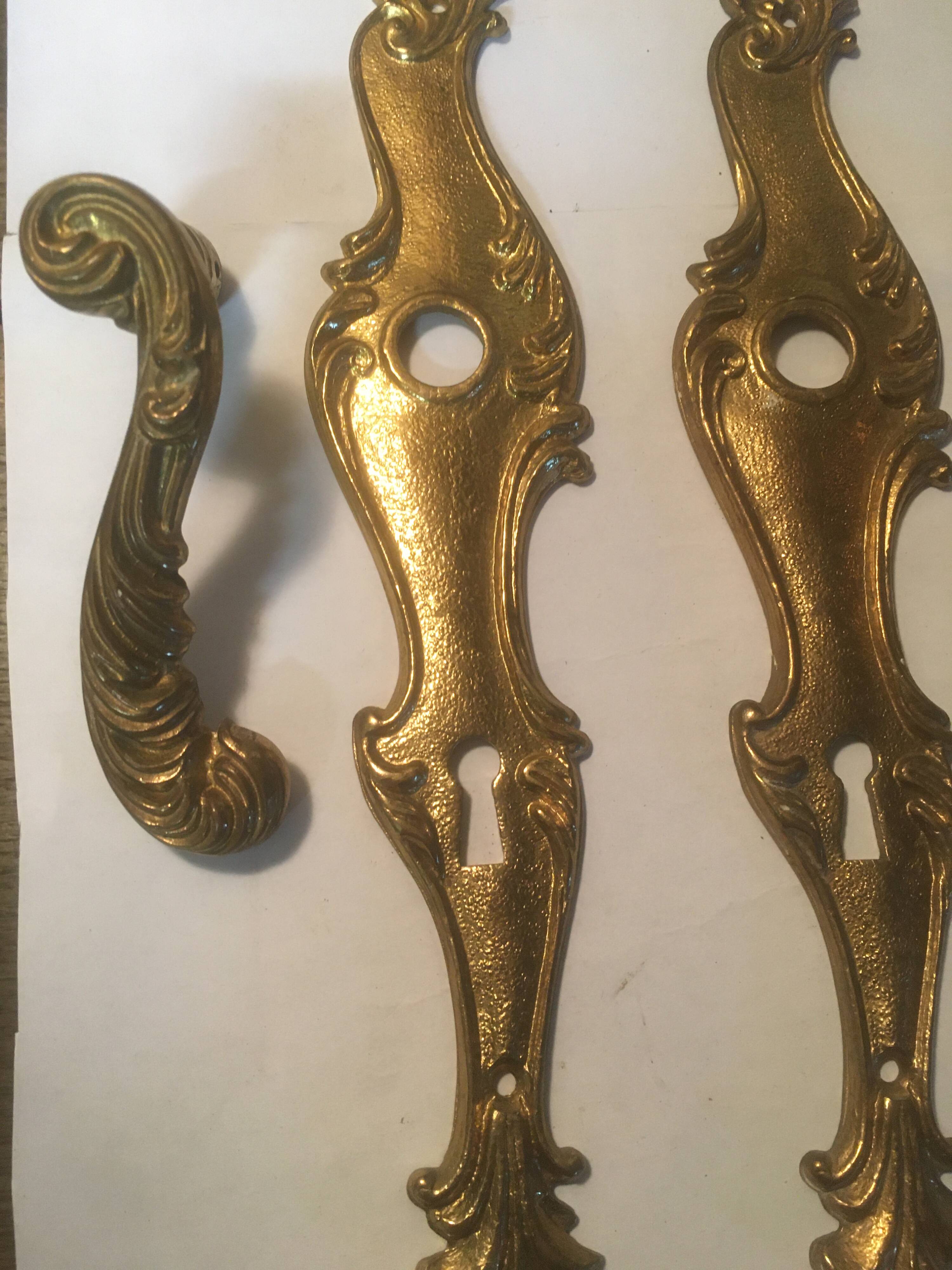 Louis xv style brass crutches and plaques