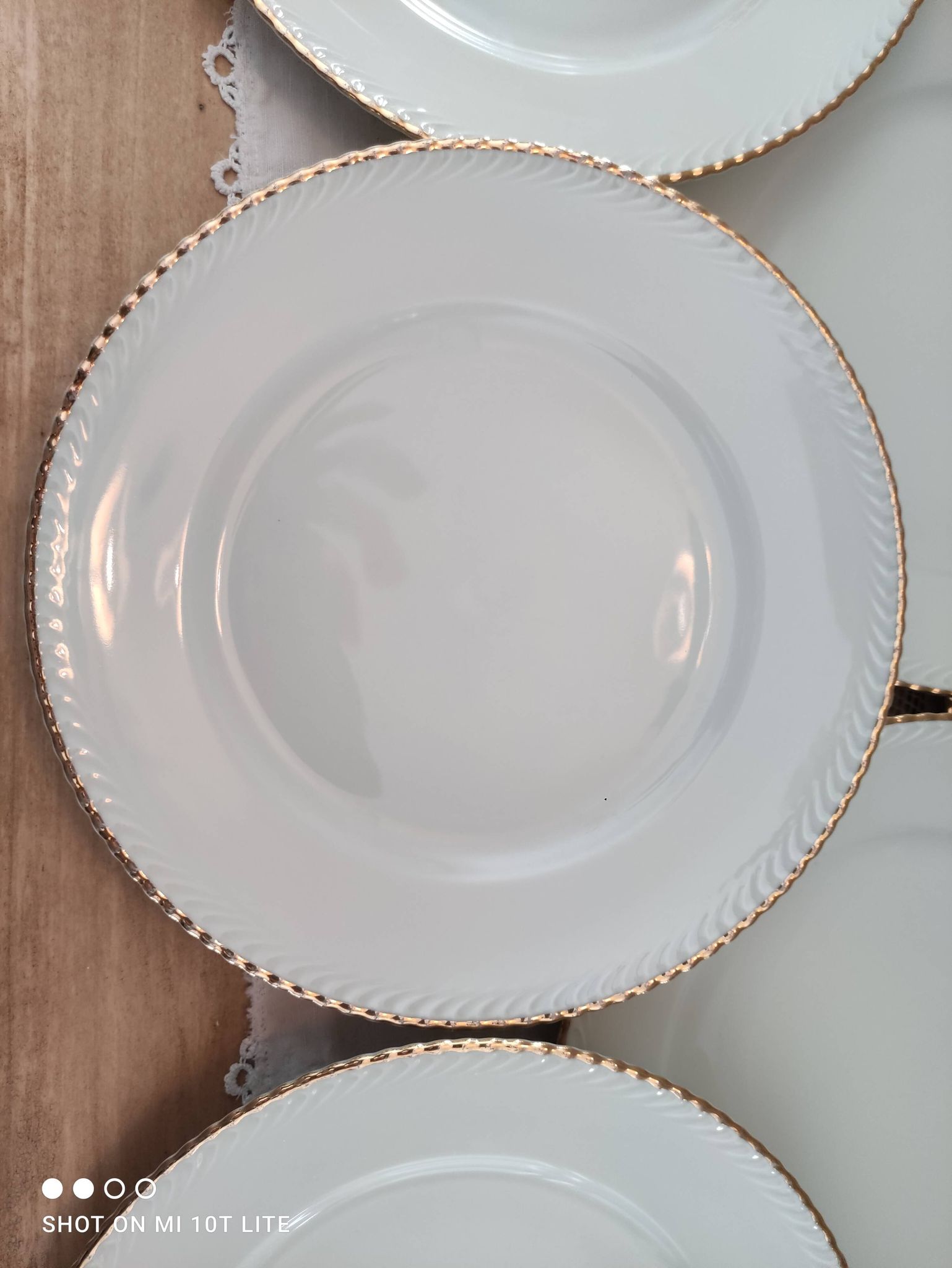 Set of 11 flat plates in porcelain Bavaria beige bordered gold model Jutta