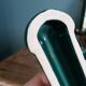 Poët Laval knife rest in emerald green ceramic and gold.