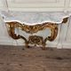 Louis XV style console in carved and gilded wood, circa 1880.