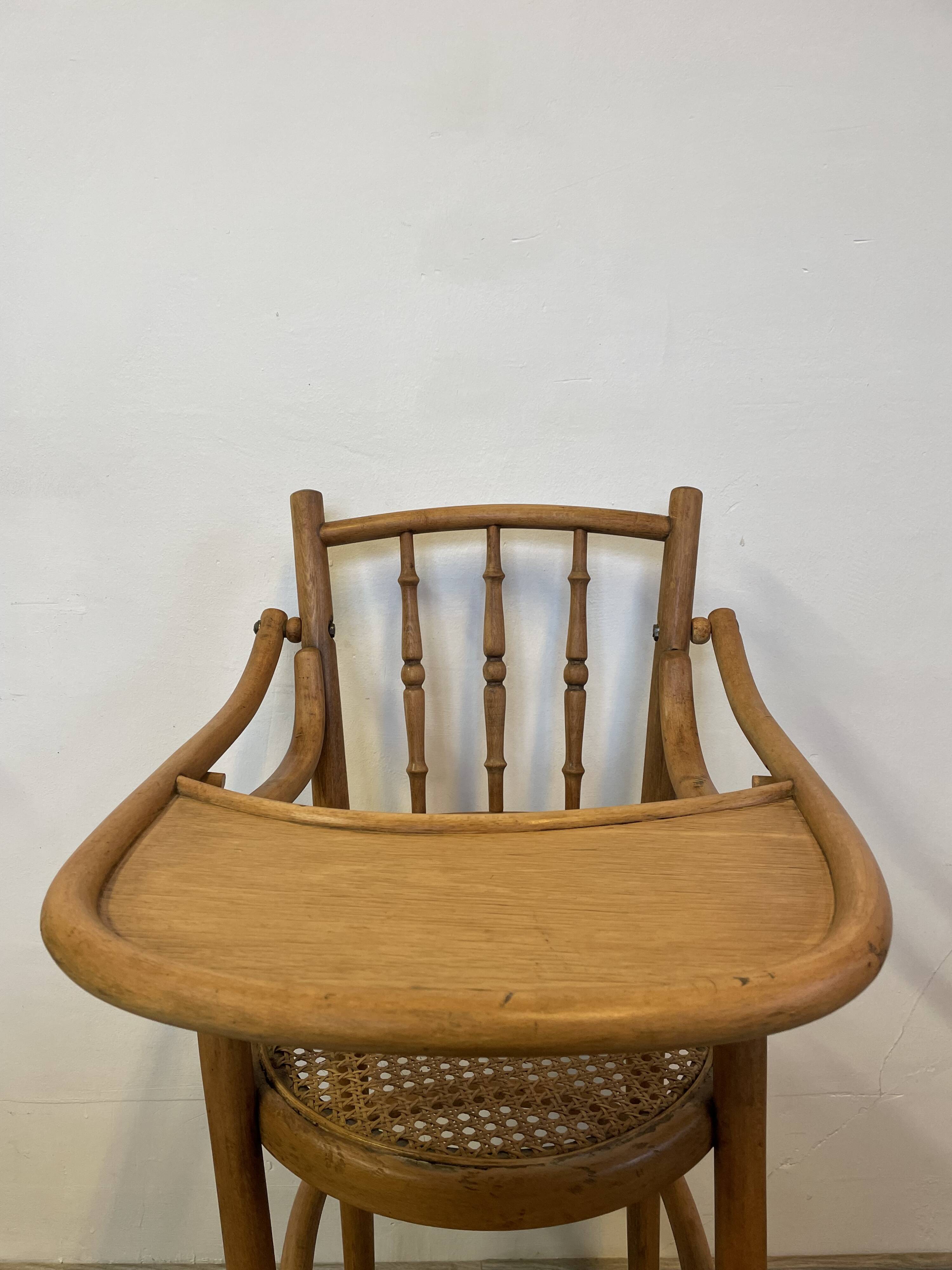 Baby high chair in curved beech