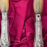 Silver and horn salad servers
