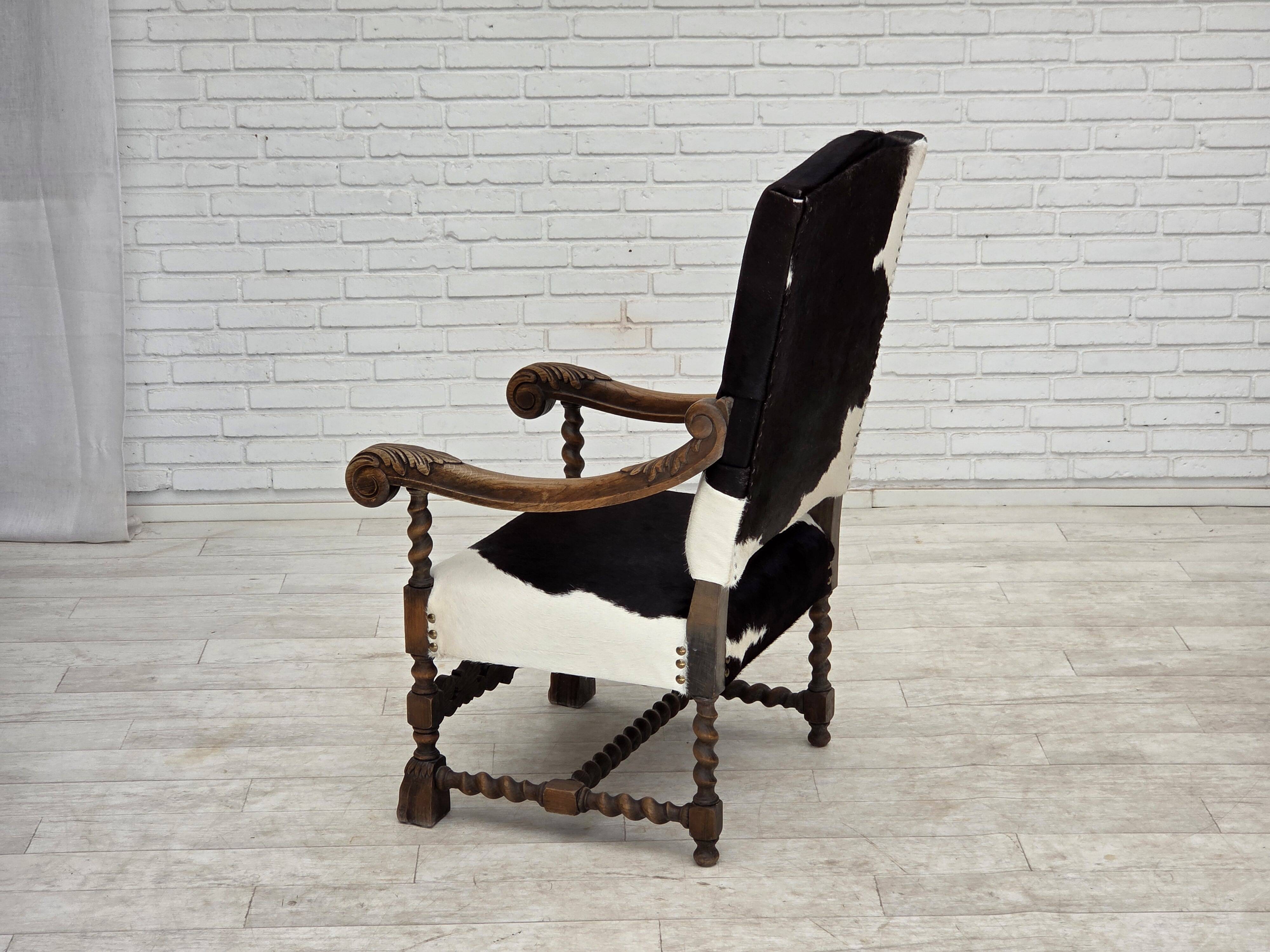 1950s, Danish highback armchair, genuine cowhide, oak wood.