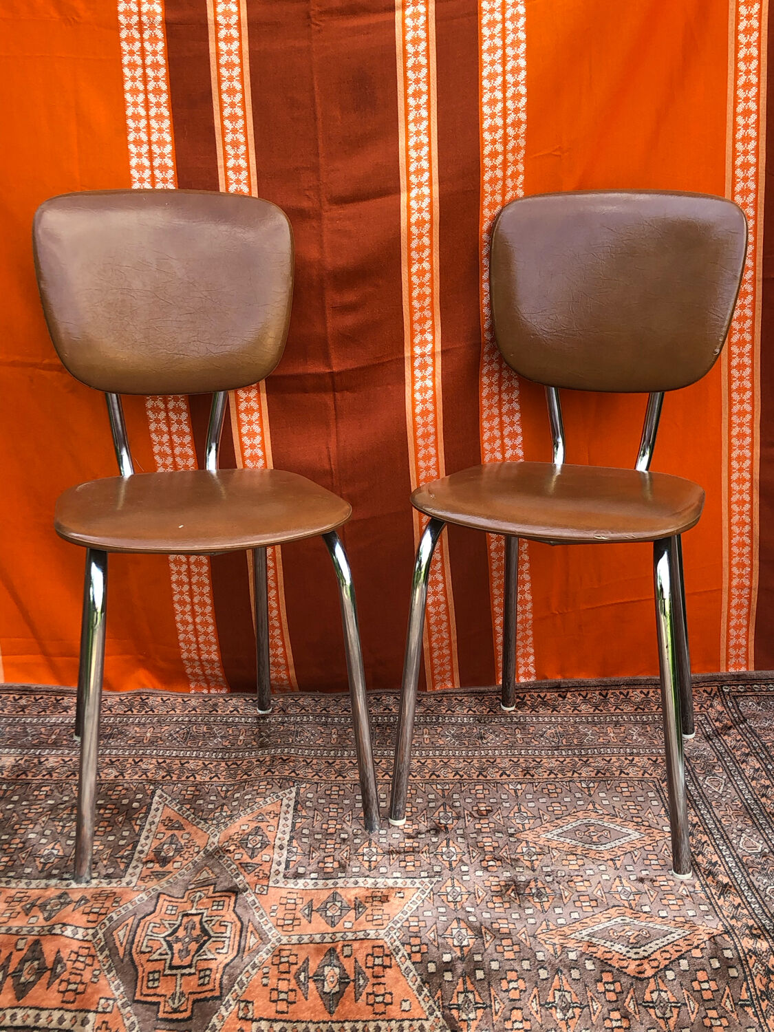 Pair of imitation leather chairs