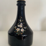 Black vase with flowers