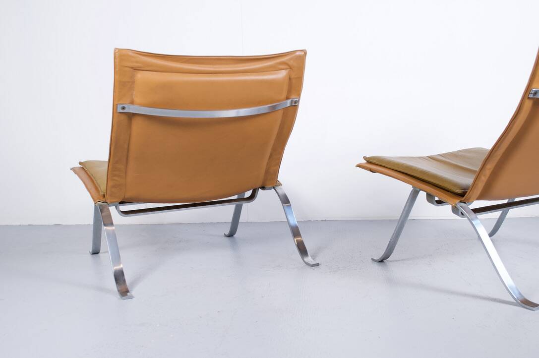 Imposing pair of leather and steel armchairs from the 1960s