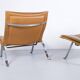 Imposing pair of leather and steel armchairs from the 1960s