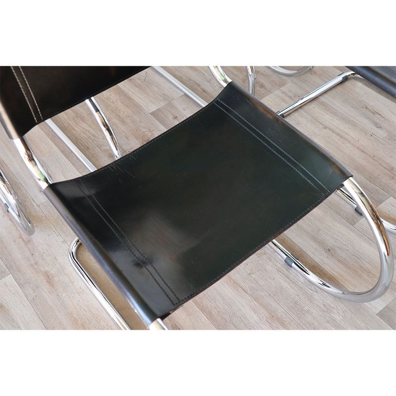Series of 6 minimalist chairs in chrome metal and black leather around 1970