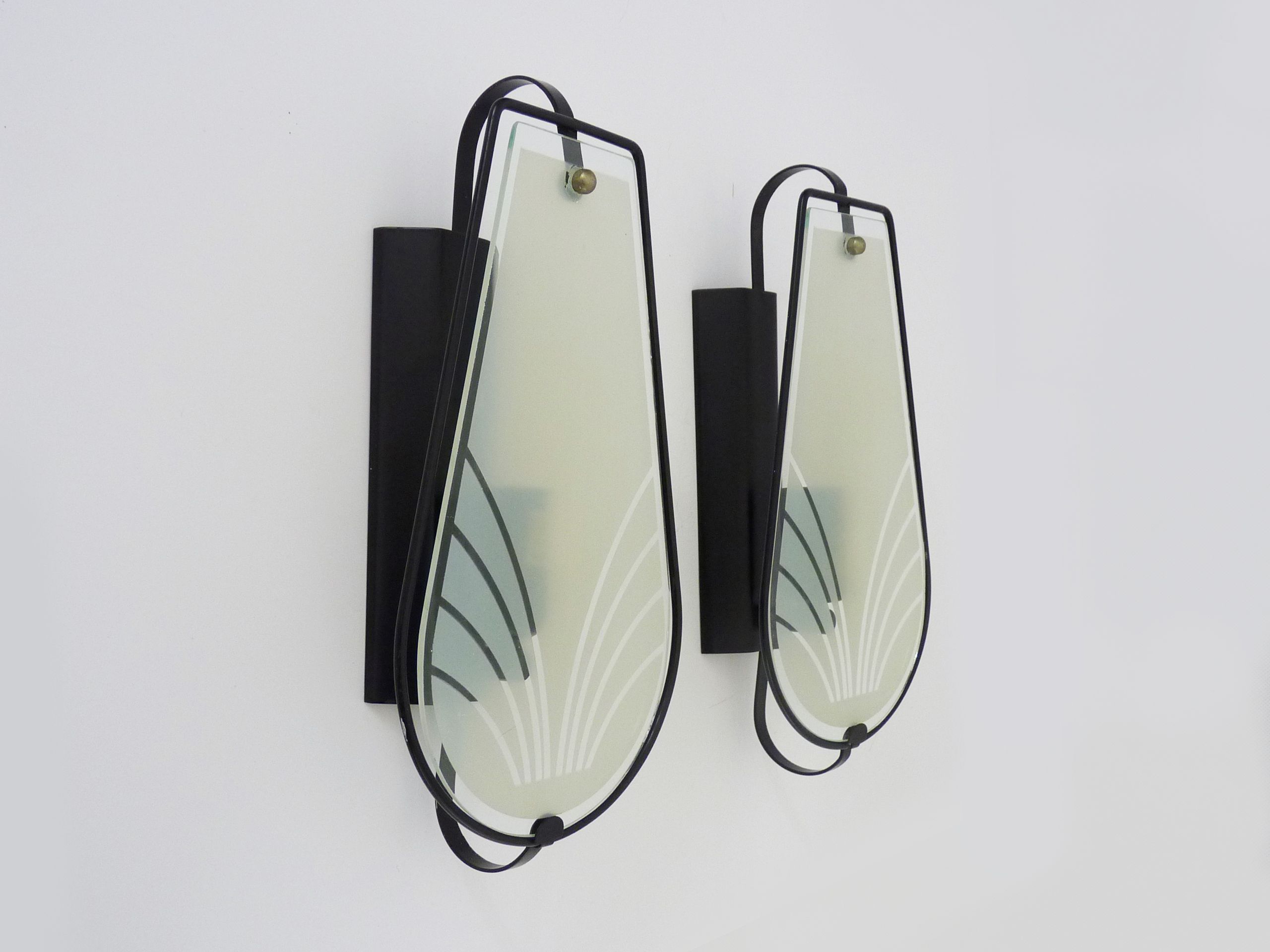 Pair of vintage wall appliques in black metal and blue patterned glass. Year 70