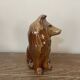 Vintage brown handmade ceramic Collie dog figurine decoration.