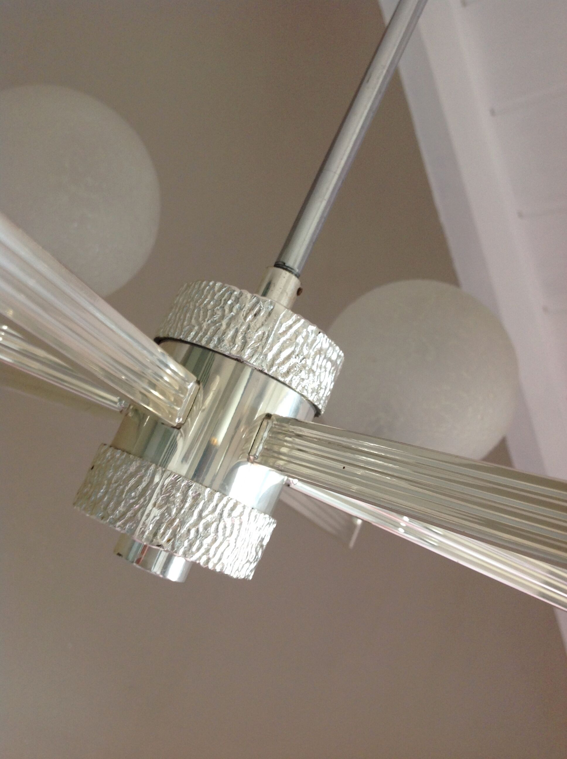 Six-light chrome metal chandelier and opaque glass globes / vintage 60s and 70s