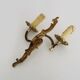 Antique double wall sconce in bronze, acanthus leaf design.