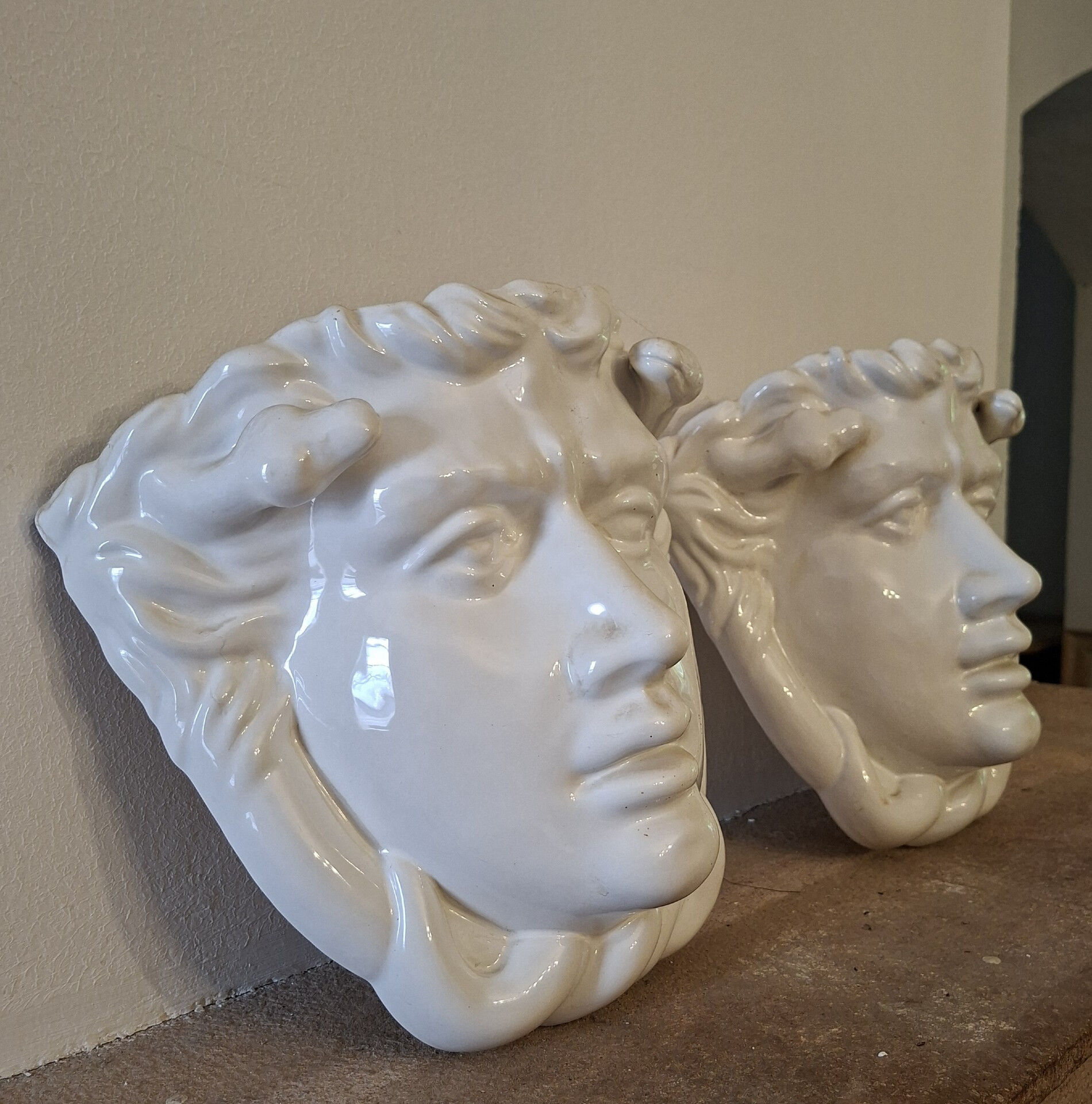 Pair of white glazed ceramic wall planters