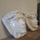Pair of white glazed ceramic wall planters