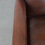 Armchair made of sheepskin leather in art deco design with warm colours