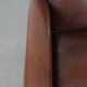 Armchair made of sheepskin leather in art deco design with warm colours