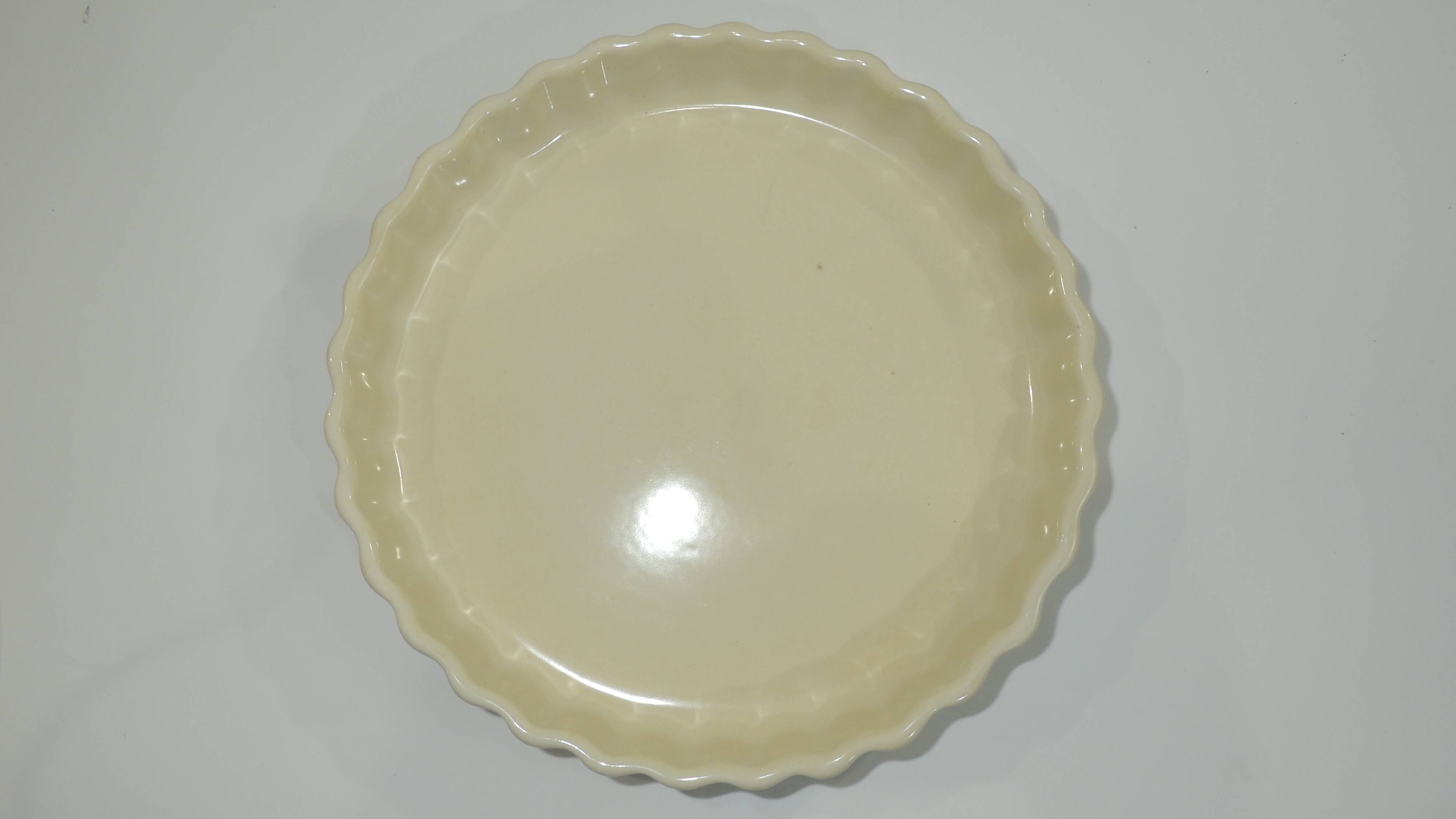 Magnificent fruit tart dish in slip signed "What's Vincent Cadeaux