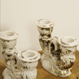 Set of two antique porcelain candle holders