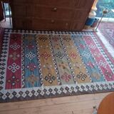 Kazakh oriental rug, vintage kilim from the 1930s. Handcrafted work.