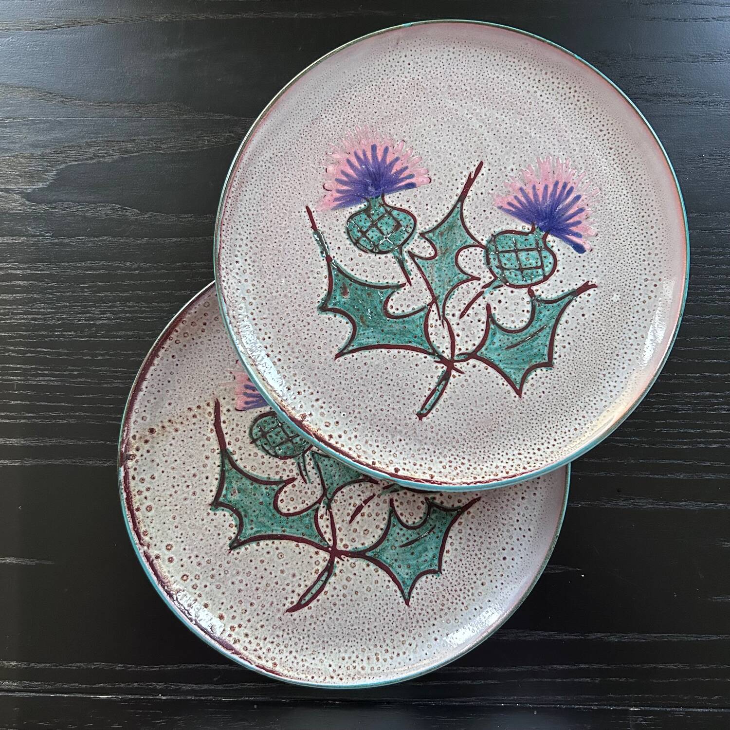 Pair of plates with thistle decoration