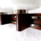 Applies double teak and chrome metal