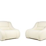 Pair of armchairs with fine curls. Contemporary work.
