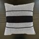 Woven striped cushion