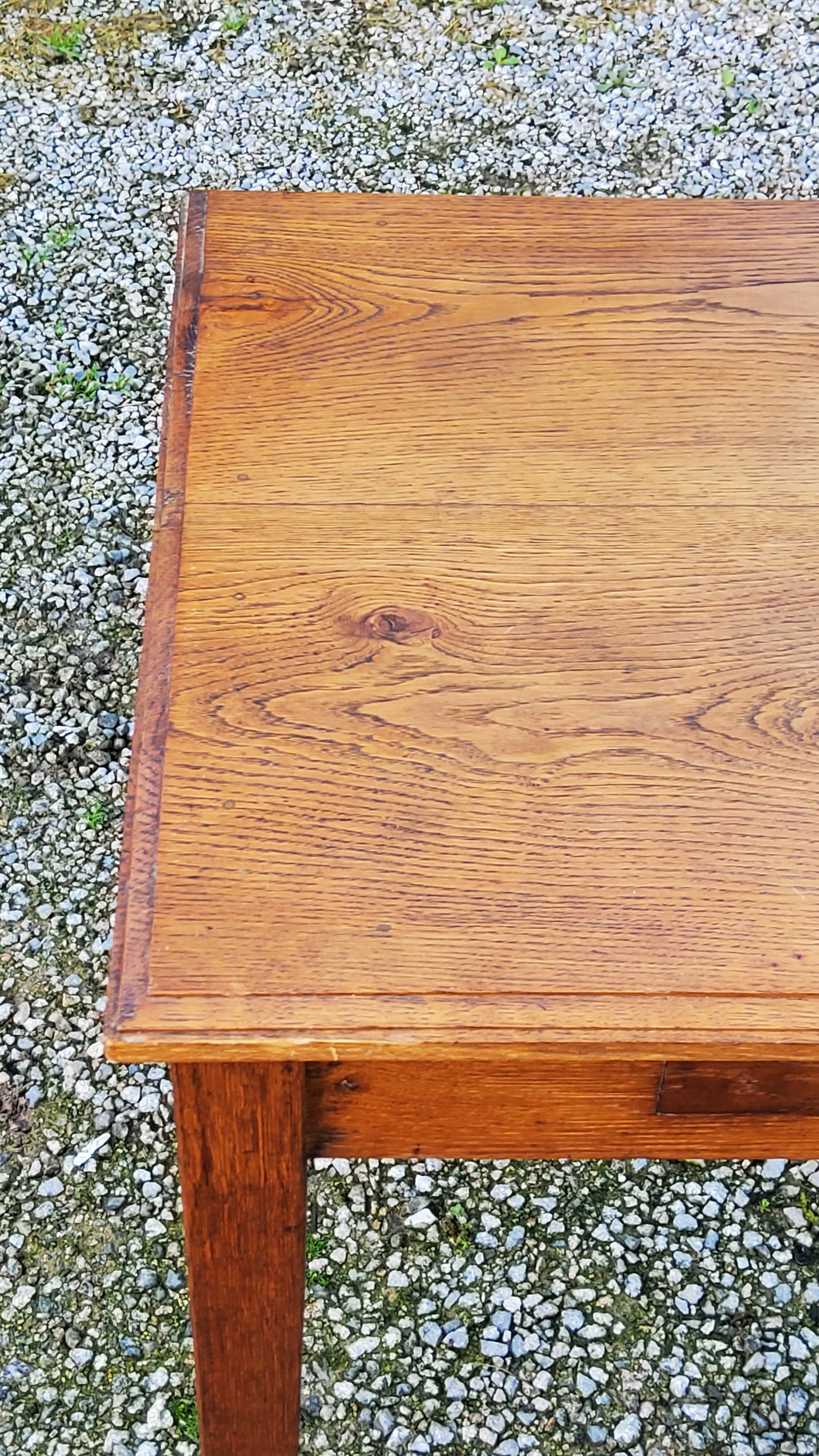 Oak writing table with spindle legs, early 20th century