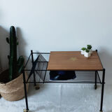 Table has record player, wearing vintage discs