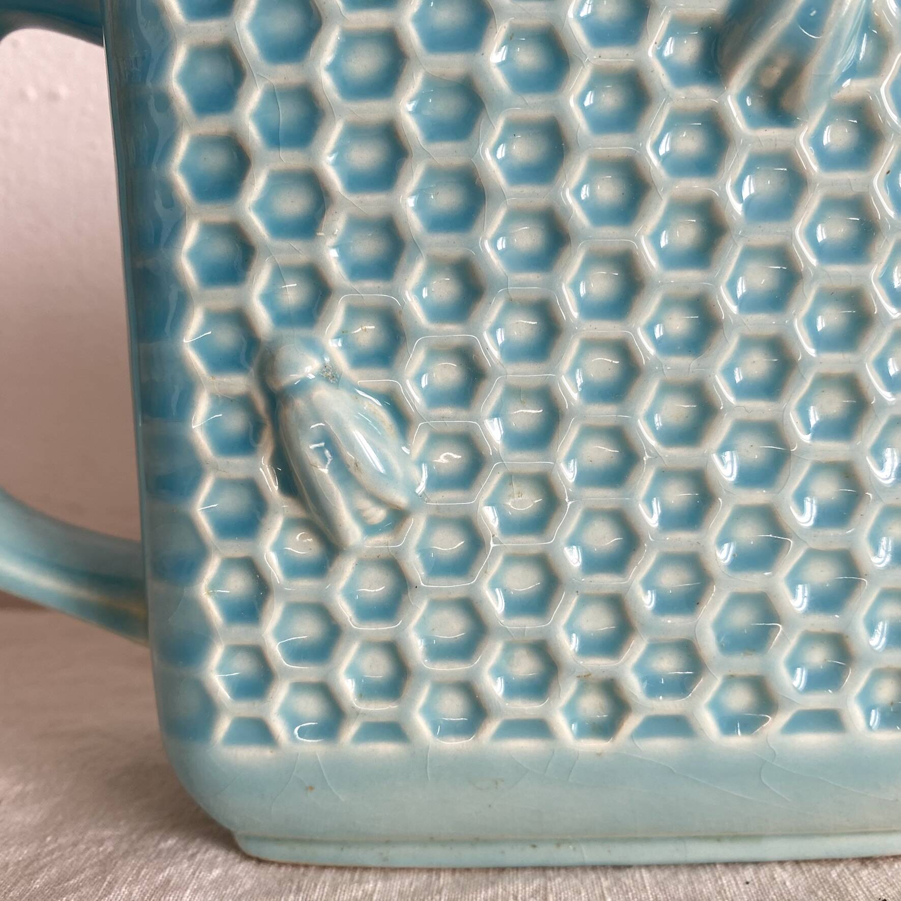 St Clément earthenware jug with bee decoration.