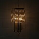 Lustre quatre flammes avec perles de verre laiton
