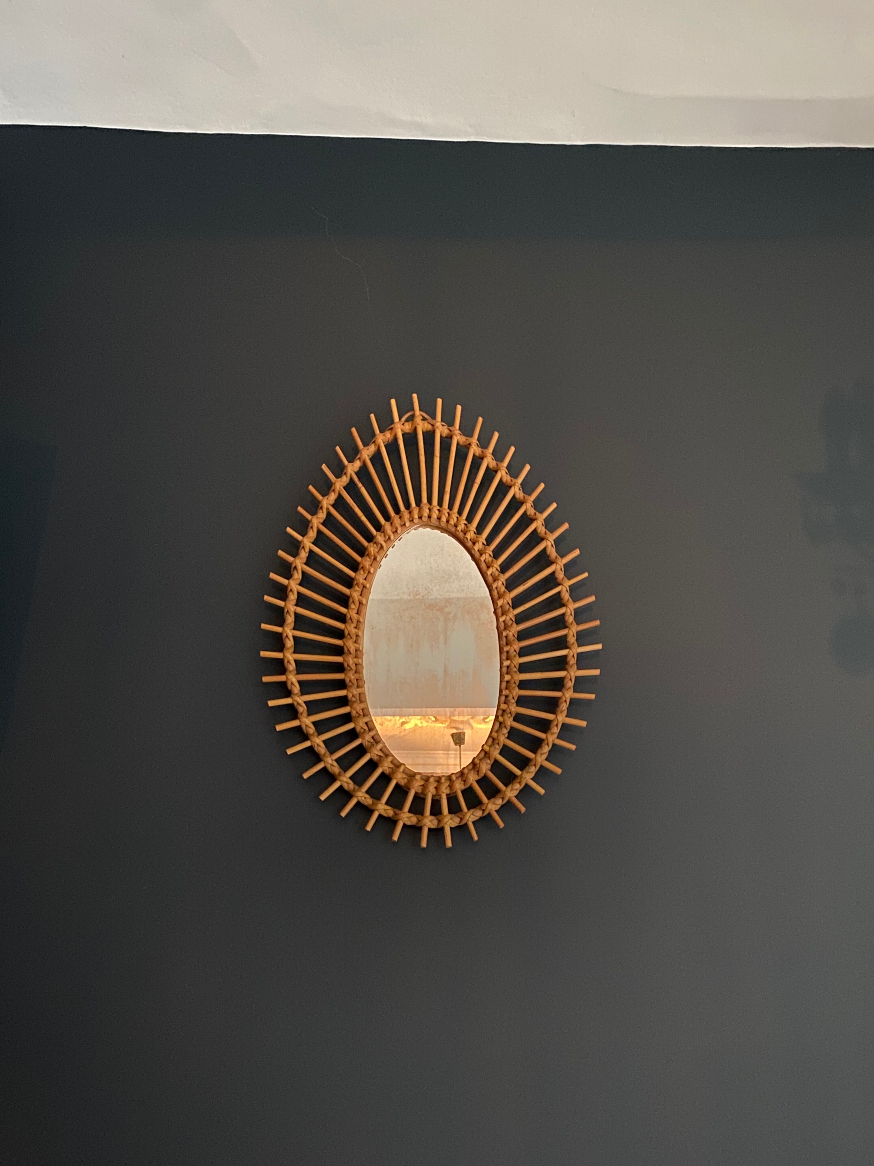 Vintage rattan sun mirror