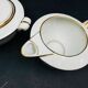 Limoges porcelain A. Vignaud sugar bowl and milk jug with gold trim