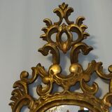 Miroir XIXème en bois sculpté doré 46 x 93 cm