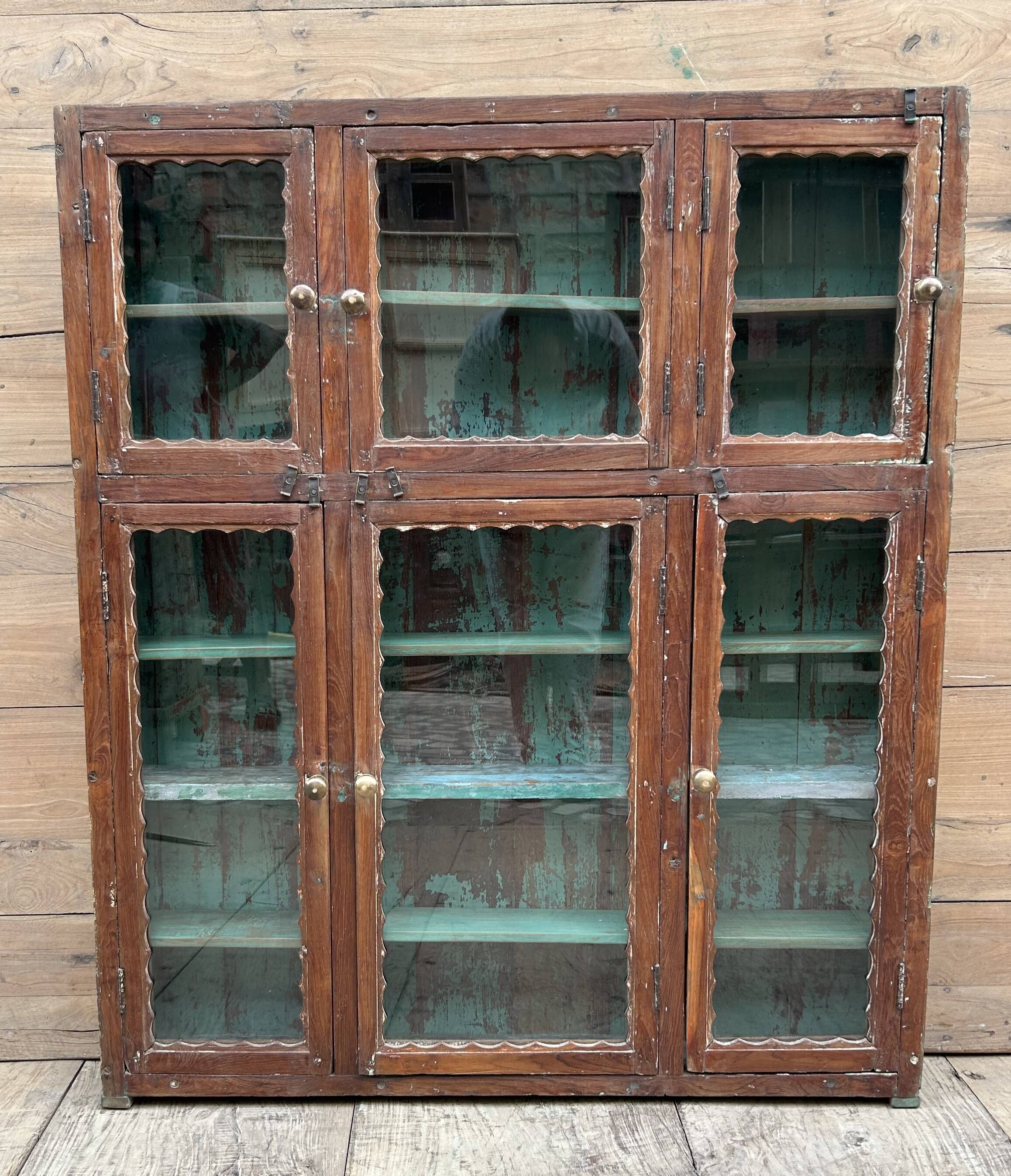 glass library in Burmese teak