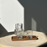 Trio of rounded rectangular trays or cups in monoxyl teak L:35