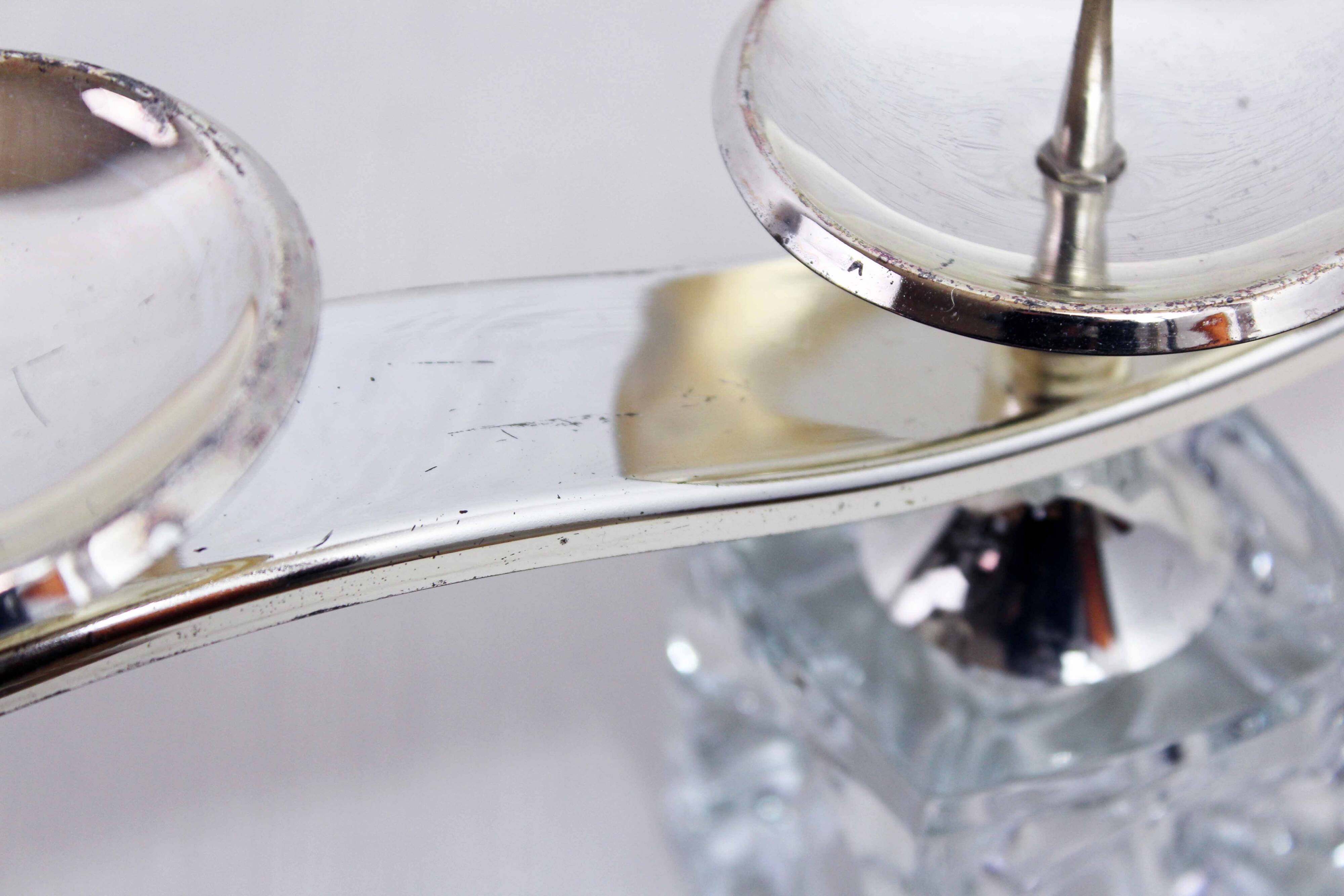 Glass and silver-plated metal candle holder