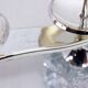 Glass and silver-plated metal candle holder