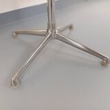 Vintage Eames round table for Vitra in white melamine, wood, and metal.