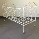 White wrought iron folding bed