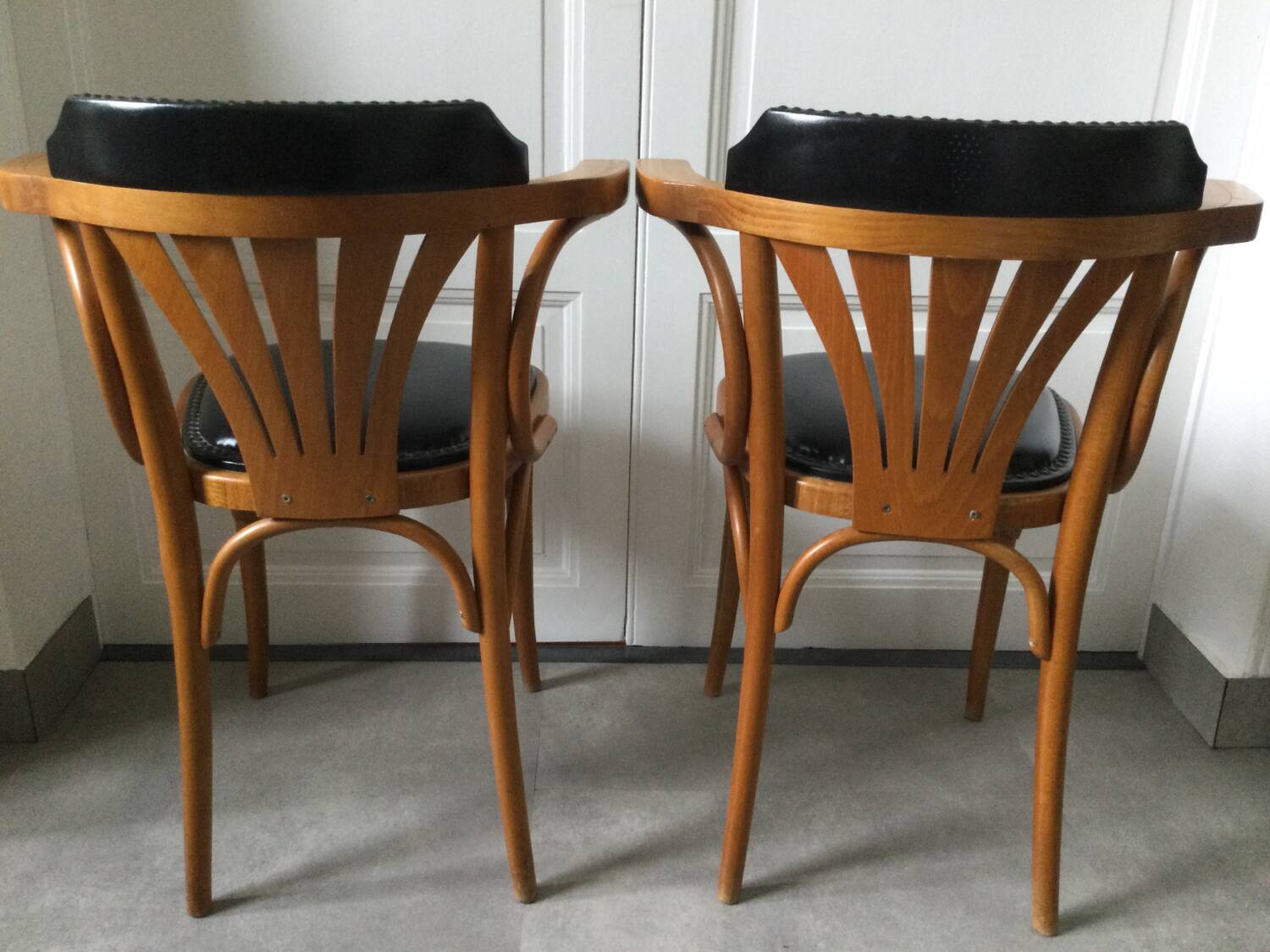 Pair of curved wooden bistro armchairs